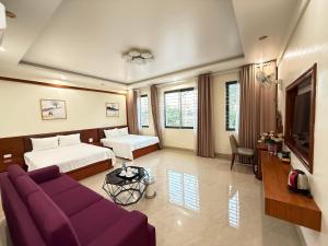 Μια τηλεόραση ή/και κέντρο ψυχαγωγίας στο Bảo Châu Hotel