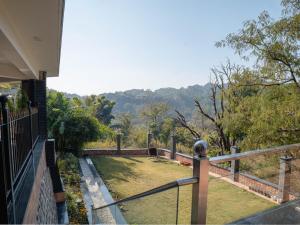 Fotografie z fotogalerie ubytování White Lotus Kanu's Abode v destinaci Déhrádún