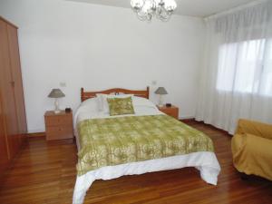 Posteľ alebo postele v izbe v ubytovaní APARTAMENTOS OUTEIRO
