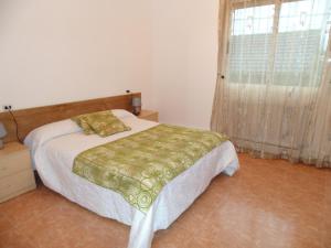 Posteľ alebo postele v izbe v ubytovaní APARTAMENTOS OUTEIRO
