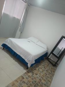 Postel nebo postele na pokoji v ubytování Apartahotel completo