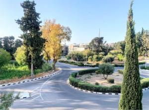 A garden outside Cozy 2BR APT - Swimming pool - Hesperides