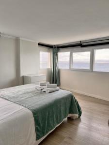 Ένα ή περισσότερα κρεβάτια σε δωμάτιο στο Duplex A La Casa Barco