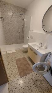 Kúpeľňa v ubytovaní Apartments Villa Alba