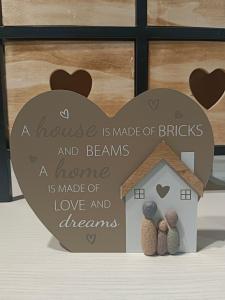 a house is made of bricks and beams a home is made of love and dreams at Mi'Ele Apartments in Pergine Valsugana
