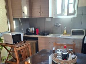 Kuchyňa alebo kuchynka v ubytovaní Olive holiday home