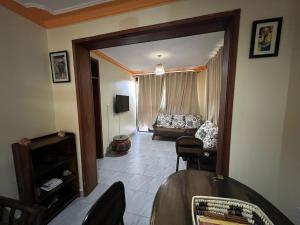 TV a/nebo společenská místnost v ubytování Nyumbani Abode + 2 fotografie