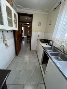 Kuchyň nebo kuchyňský kout v ubytování Nyumbani Abode