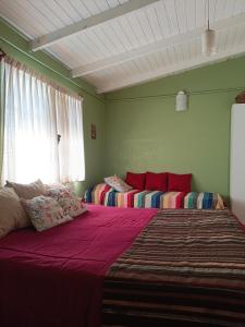 En eller flere senge i et værelse på Mary's House