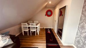 Postel nebo postele na pokoji v ubytování Ferienwohnung Leev un Lee + 5 fotografií