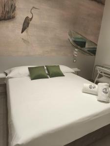 Postel nebo postele na pokoji v ubytování B&B Aura