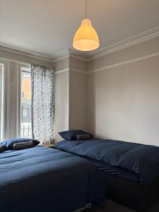 Postel nebo postele na pokoji v ubytování Superb Triple Room near Croke Park - 4