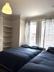 Postel nebo postele na pokoji v ubytování Superb Triple Room near Croke Park - 4