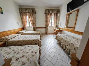 Postel nebo postele na pokoji v ubytování Hotel Pace + 28 fotografií