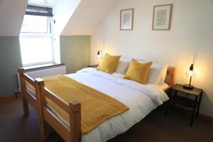 Postelja oz. postelje v sobi nastanitve Glengarriff Hostel