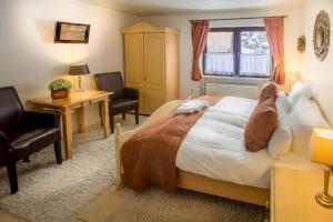 Katil atau katil-katil dalam bilik di Hotel Garni Zeranka