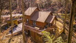 an overhead view of a tree house in the woods at Whispering Pines Cabin in Whittier