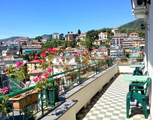 a balcony with a view of a city at Attic Apartment in Rapallo