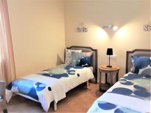 Postel nebo postele na pokoji v ubytování Apartment En Capillo + 11 fotografií