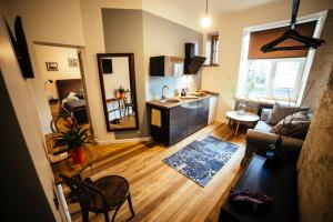 A kitchen or kitchenette at Baltic Design Apartments with free Parking