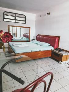 Postel nebo postele na pokoji v ubytování Onix Motel