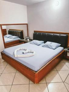 Postel nebo postele na pokoji v ubytování Onix Motel