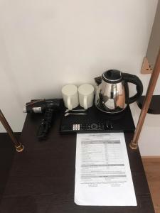 Příslušenství pro přípravu čaje a kávy v ubytování Signature Mithras Hotel25