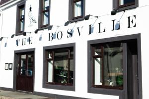 a store front with a building at Bosville Hotel in Portree