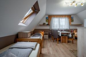 Posteľ alebo postele v izbe v ubytovaní Pokoje gościnne Tessa
