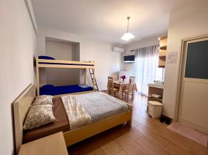 Postel nebo postele na pokoji v ubytování Garden Villa A&X