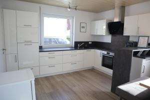 Kuchyň nebo kuchyňský kout v ubytování Ferienwohnung kleine Auszeit