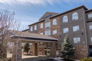 a rendering of the front of a hotel at Canalta High River in High River