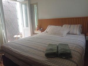 Recanto Paraense客房内的一张或多张床位