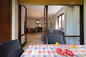 a table with a pair of flip flops on top at Darina - Immobiliare Azzurra in Lazise