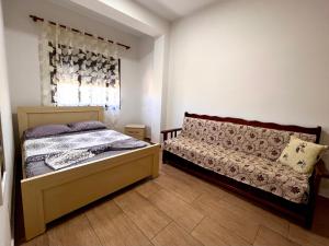 Postel nebo postele na pokoji v ubytování Garden Villa A&X