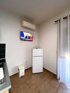 Kuchyň nebo kuchyňský kout v ubytování Garden Villa A&X
