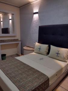 Postel nebo postele na pokoji v ubytování Hotel Astur