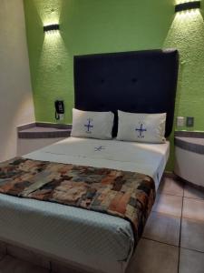 Postel nebo postele na pokoji v ubytování Hotel Astur