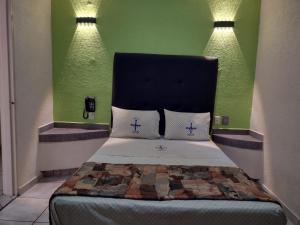 Postel nebo postele na pokoji v ubytování Hotel Astur