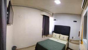 Postel nebo postele na pokoji v ubytování Hotel Astur