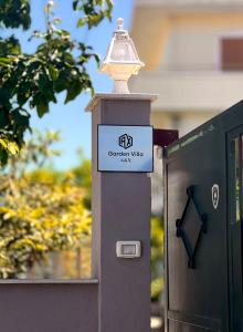 Certifikát, hodnocení, plakát nebo jiný dokument vystavený v ubytování Garden Villa A&X
