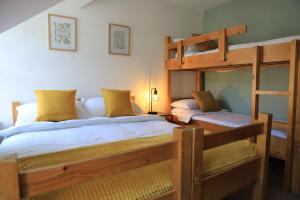 Postelja oz. postelje v sobi nastanitve Glengarriff Hostel