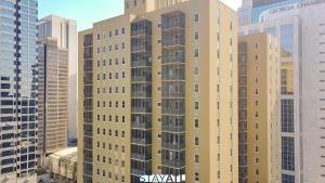 a tall building in a city with tall buildings at Prime Downtown Atlanta Condo with Balcony in Atlanta +6 photos