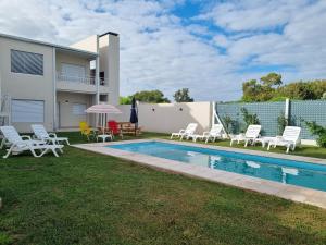 Bazén v ubytování Departamentos Roque Pérez Norte nebo v jeho okolí