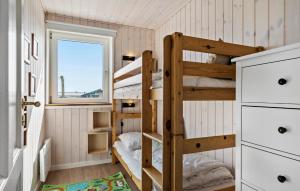 Postel nebo postele na pokoji v ubytování Holiday Home Bjerregårdsvej Denm I