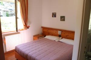 Voodi või voodid majutusasutuse Hotel Culmine toas
