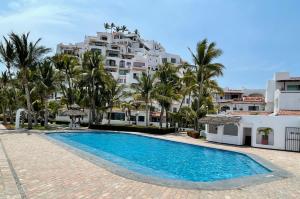 Πισίνα στο ή κοντά στο Departamentos Condominio Puerto las Hadas