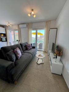 Χώρος καθιστικού στο Apartment WILD ROSE