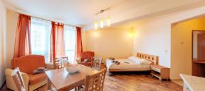 Posteľ alebo postele v izbe v ubytovaní Apartamenty Diva Kołobrzeg