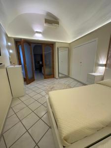 Ένα ή περισσότερα κρεβάτια σε δωμάτιο στο Casa Donda +3 φωτογραφίες